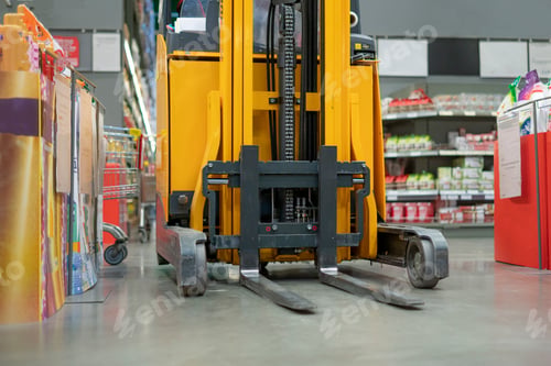 Preview: a forklift in the warehouse working and lifting the boxes of new income products