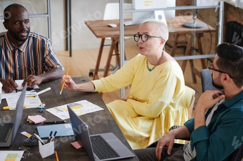 Preview: Business leader talking to her employees