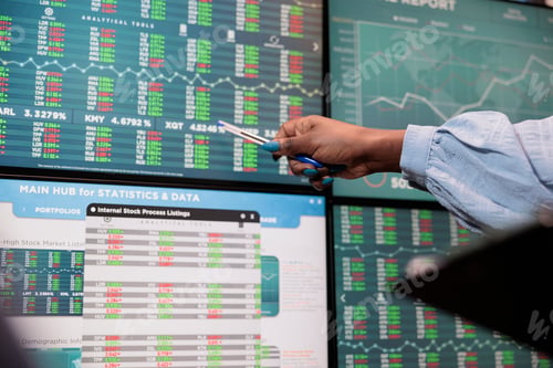 Preview: Close up shot of brokerage company employee indicating on display real time profit growth