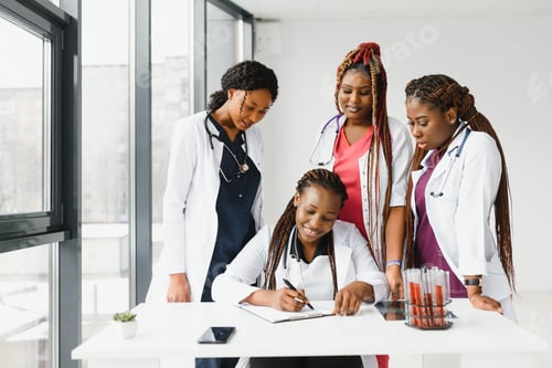 Preview: African-American black doctor woman and medical group.