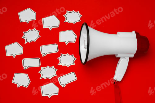 Preview: Electronic megaphone with speech bubble on red background