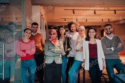 Preview: A diverse group of successful business people in a modern glass office.