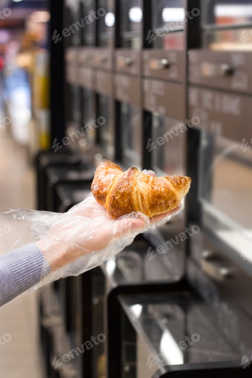 Preview: Female Hand Choosing Bread In The Market