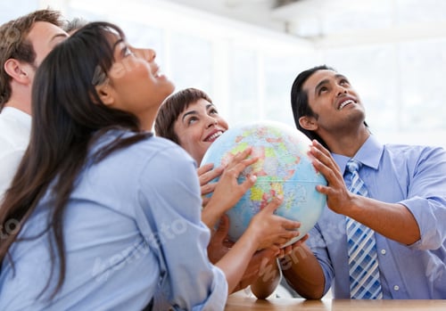 Preview: International Business Team Holding A Terrestrial Globe In A Meeting