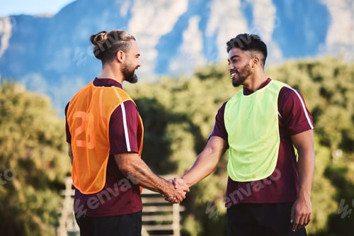 Preview: Handshake, rugby team and men in sports, exercise training or cooperation at field outdoor. Shaking