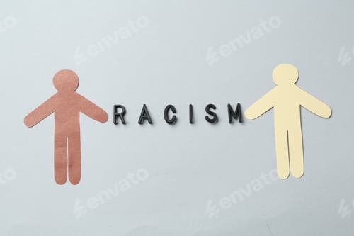 Preview: Word Racism and human paper figures of different colors on light grey background, top view