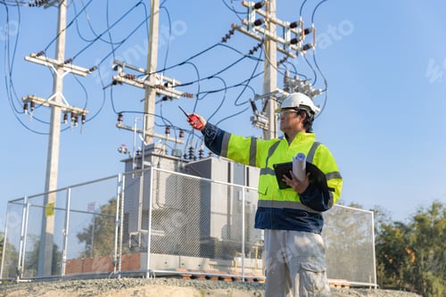 Preview: Electrical engineer working in site the Big Electrical transformer Site.