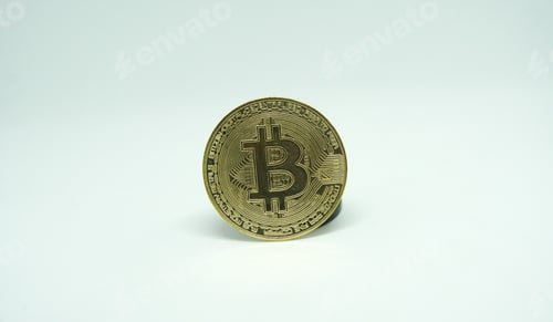 Preview: Closeup shot of a golden bitcoin on a white background