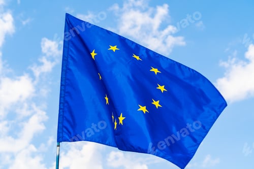 Preview: European Union flag against blue sky waving