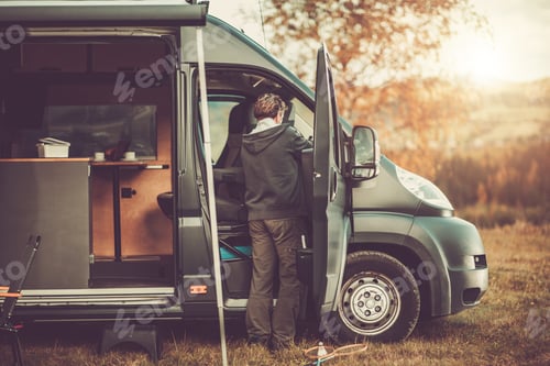 Preview: Men with RV Camper Van on a Camping