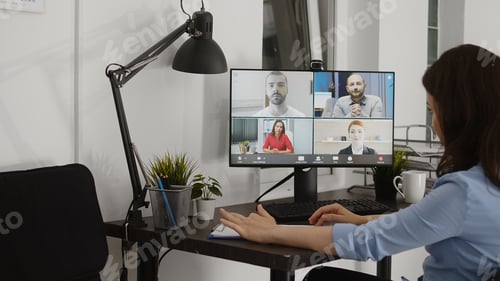 Preview: Young adult attending business meeting videocall