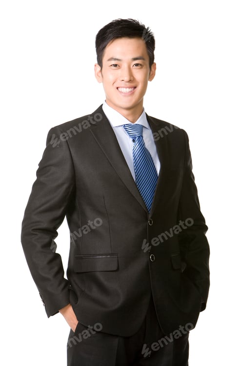 Preview: Young businessman with hands in pocket