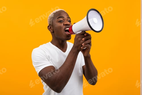 Preview: black american man in white t-shirt tells the news through a megaphone on an isolated orange