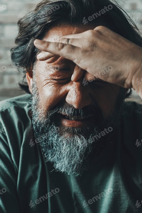 Preview: Headache and migraine unhealthy concept. Man touching his front and do painful expression