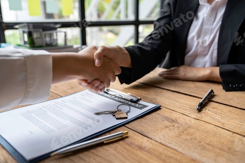 Preview: real estate agents shaking hands with customers after accepting an agreement to finish buying or ren