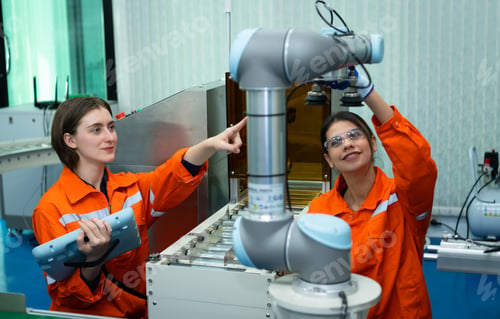 Preview: In an electronic parts facility, two female engineers In the plant,