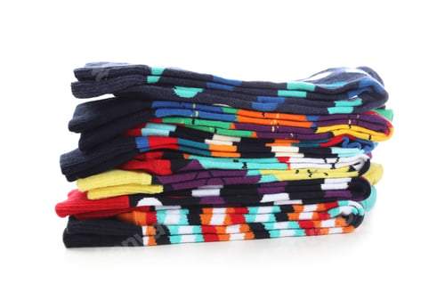 Preview: Many new colorful socks on white background