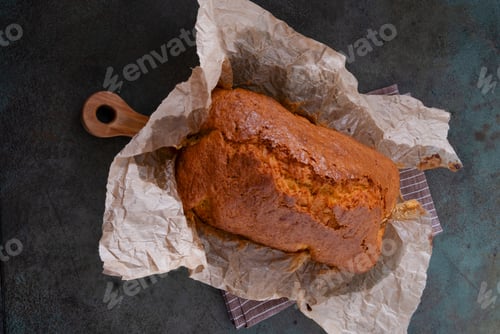 Preview: Fresh cake on parchment. Homemade baking