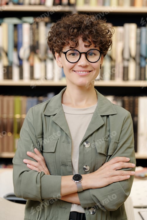 Preview: Young smiling confident female shop assistant or manager of interior design
