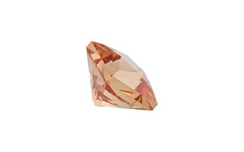 Preview: Garnet with rutile inclusions faceted old mine cut stone mineral macro photography