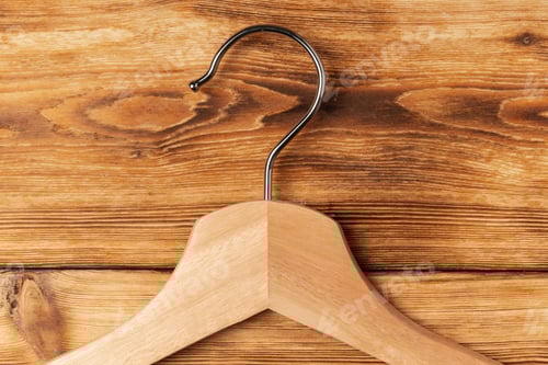 Preview: Wooden Coat Hanger on Wooden Background