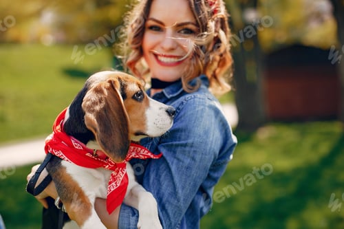 Preview: Elegant and stylish girl in a spring park