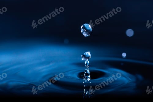 Preview: abstract background of blue water splash falling drop on liquid wave