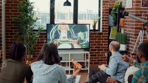 Preview: Happy people winning video games competition at gathering