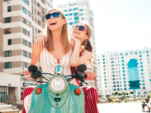 Preview: Two young beautiful woman posing outdoors