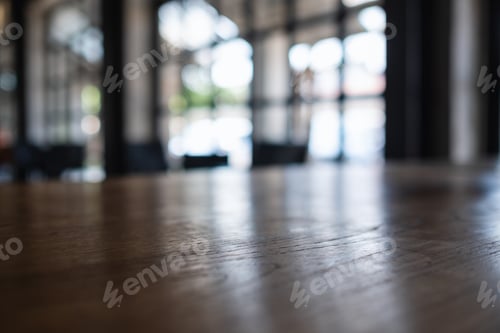 Preview: Wooden table top with blurred background in cafe
