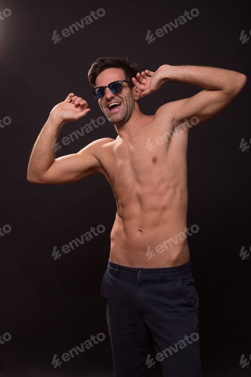 Preview: Confident Young Man Posing Abs Fit Slim Black Background Happy Smiling