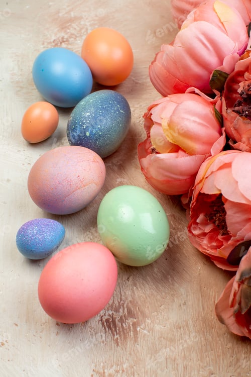Preview: front view colored easter eggs with flowers on brown background holiday horizontal spring easter