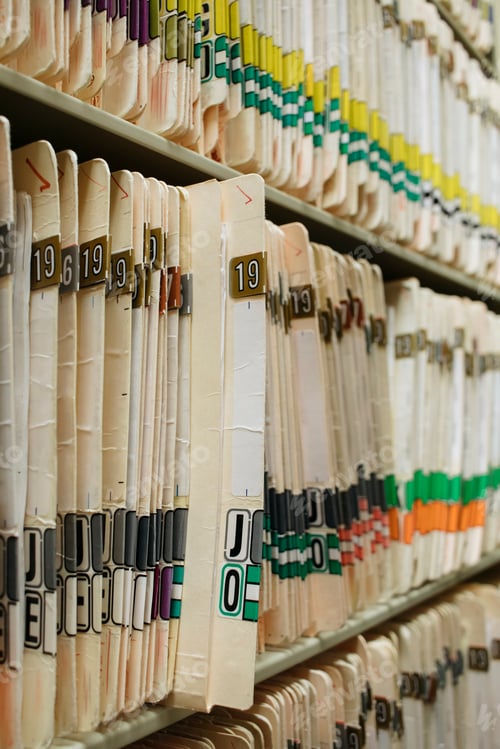 Preview: Patient medical charts filed away, paper records