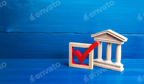Preview: Government building and red check mark.