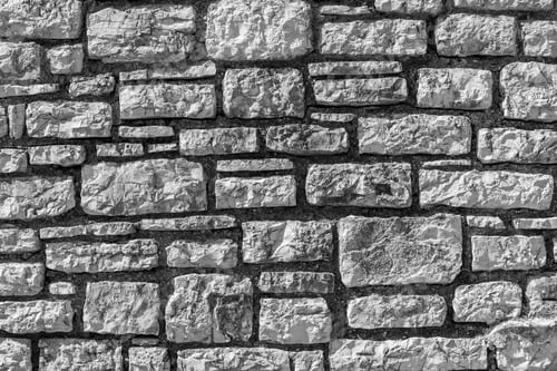 Preview: The Abstract Textured Background Of A Stone Wall Closeup And A Blank Space For The Text