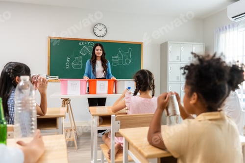 Preview: Group of student learn with teacher in classroom at elementary school.