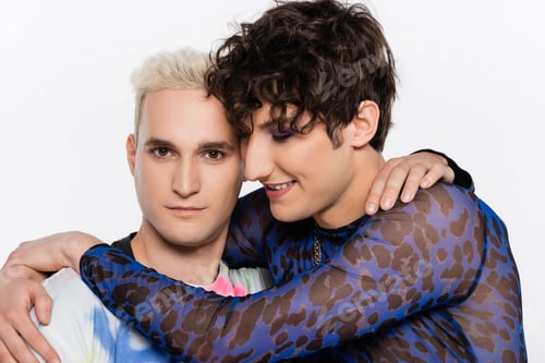 Preview: brunette queer person embracing blonde gay man isolated on grey