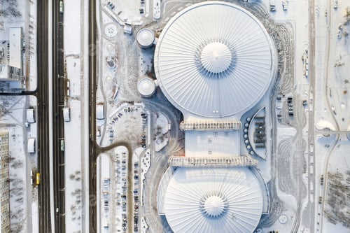 Preview: Top view in winter of a modern sports complex with parking in Minsk. Belarus