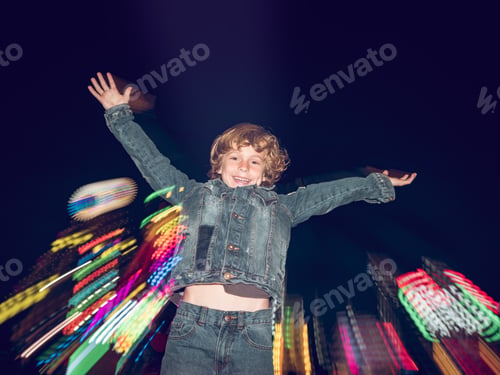 Preview: Boy jumping on funfair
