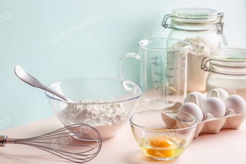 Preview: Cooking ingredients for dough, eggs, flour, sugar.