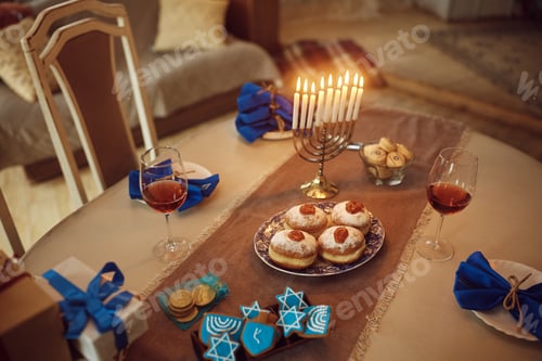 Preview: Table setting prepared for celebration of Jewish Festival of lights.