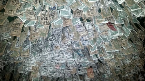 Preview: Using flash on camera phone to light up some money hanging from restaurants ceiling.