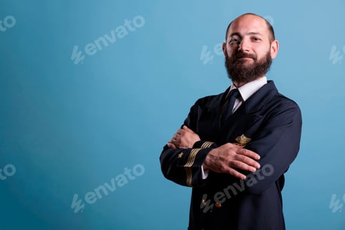 Preview: Airplane captain wearing uniform portrait