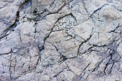 Preview: Cracked rock surface with lines