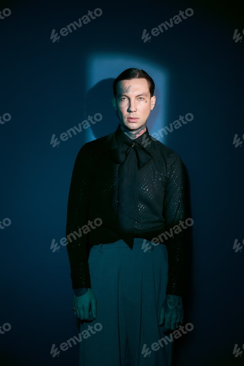 Preview: Stylish young man exudes charisma and confidence in modern fashion setting