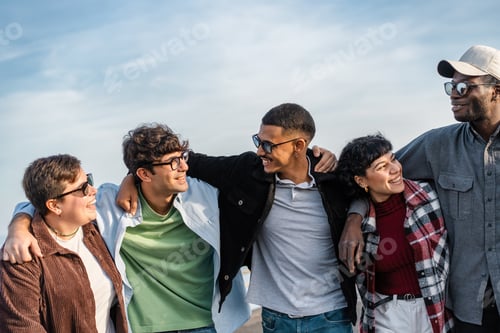 Preview: Diverse Friends Bonding in Nature - Multi-ethnic group of friends hugging