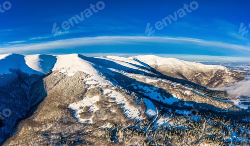 Preview: Aerial view of beautiful winter mountain slopes