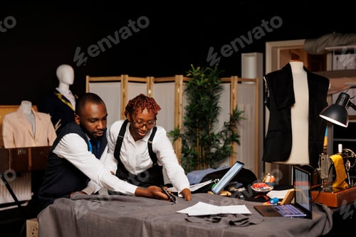 Preview: Suitmakers in studio designing clothes