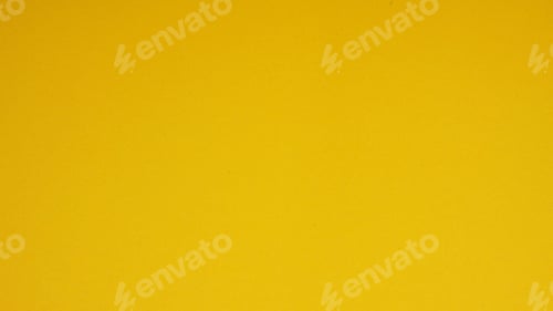 Preview: yellow paper for background.it is empty space and no people.
