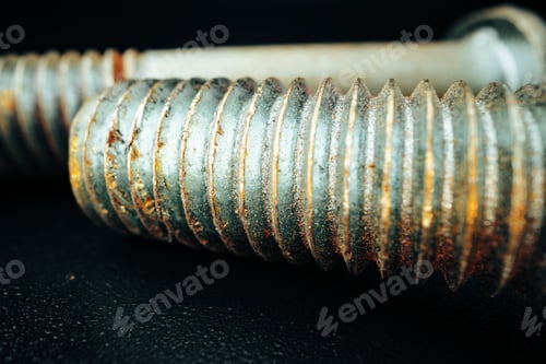 Preview: Iron screw bolts on black background close up